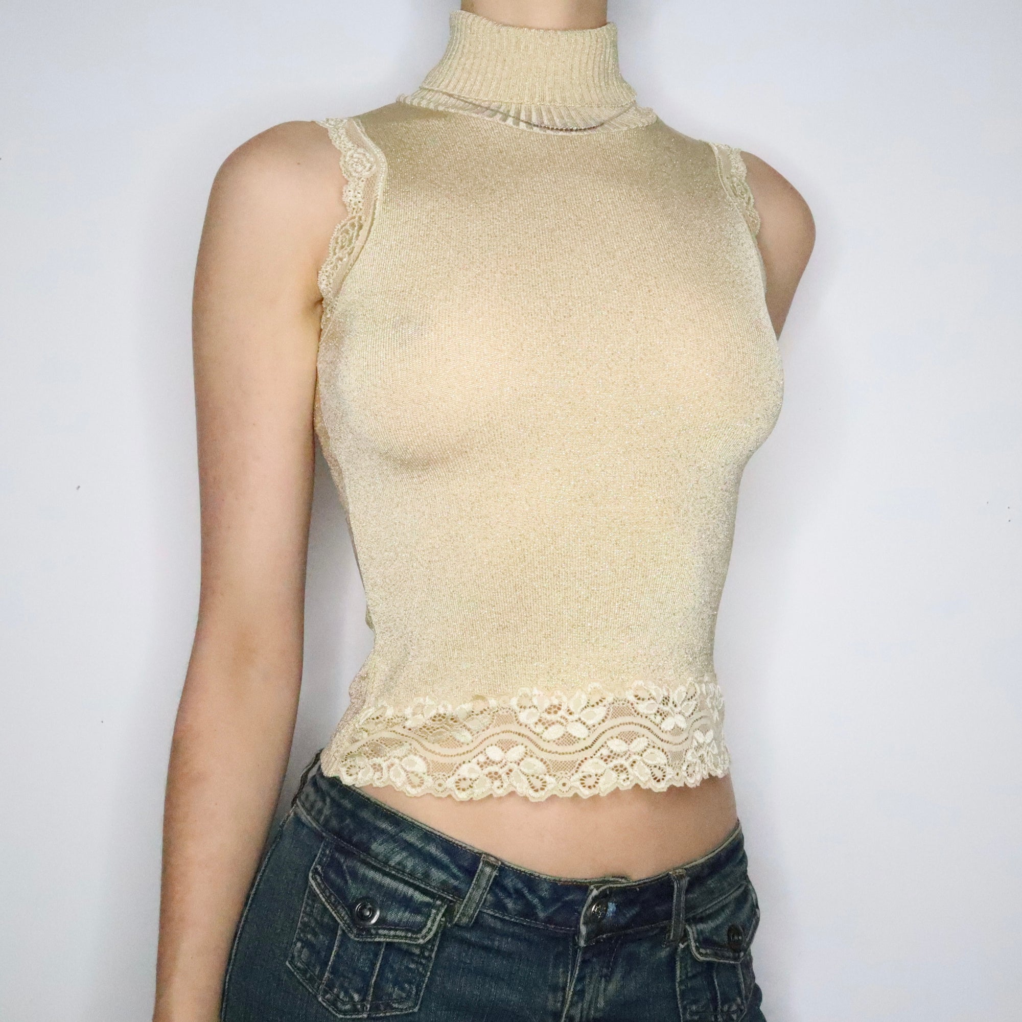 Gold hotsell sleeveless turtleneck